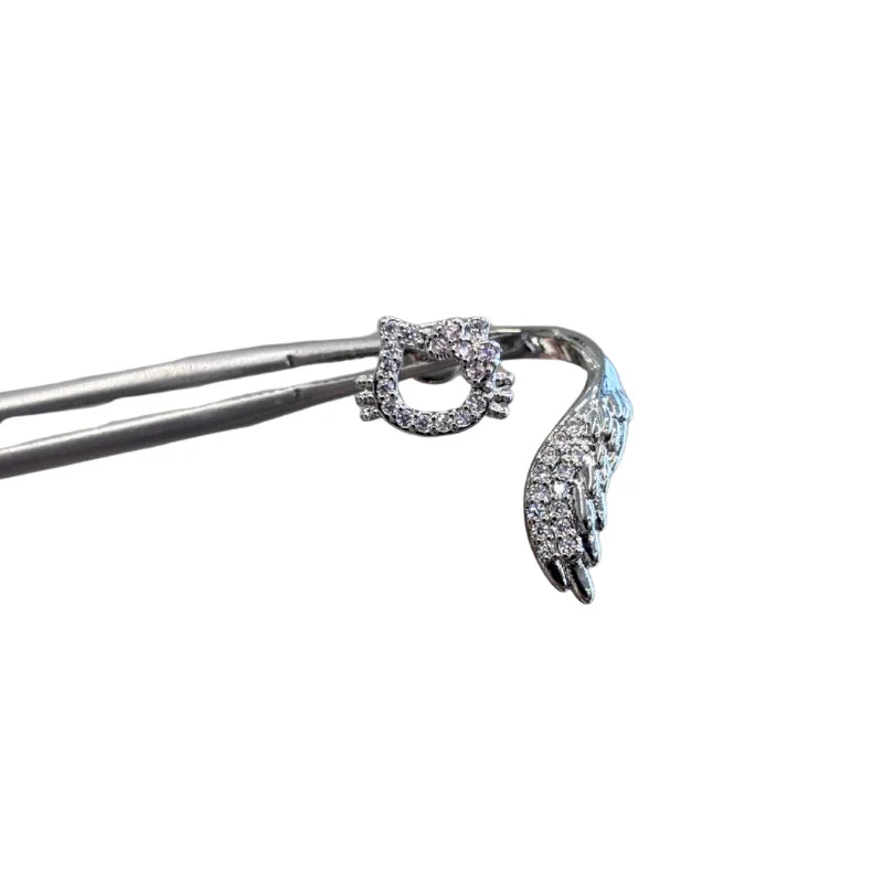 KT pink diamond bow Angel helix stud earrings