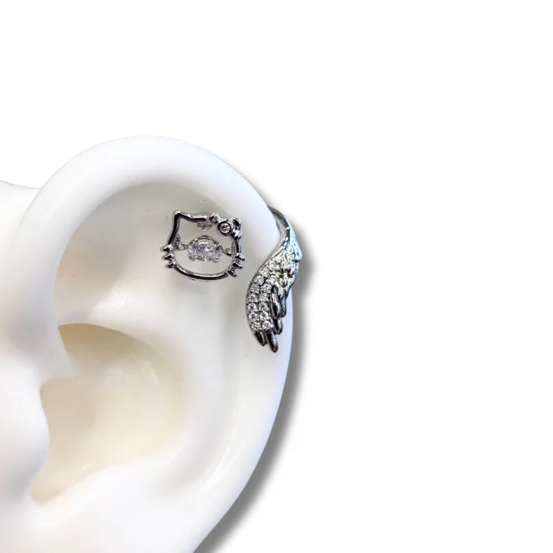 KT with a beating heart diamond bow Angel helix stud earrings